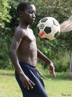 view--soccer boy Bugala Island, East Africa, Uganda, Africa