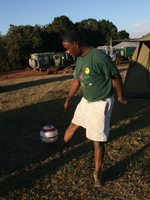mohammed playing soccer Serengeti, Ngorongoro, East Africa, Tanzania, Africa