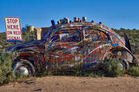 20241028182118_Paint-Splattered_Car_Art_in_Silverton