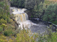 20241006162900_Majestic_Waterfall_in_Cradle_Mountain