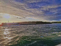 Sunset over Lakes Entrance waters 