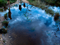 20091106115056_view--hikers_reflection