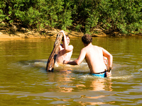 swimming in piranha infested water Fazenda Santa Clara, Mato Grosso do Sul (MS), Brazil, South America
